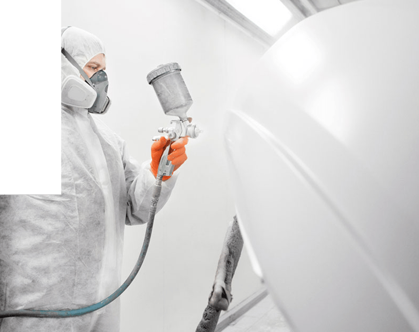 man-applying-white-paint-with-orange-gloves-cta